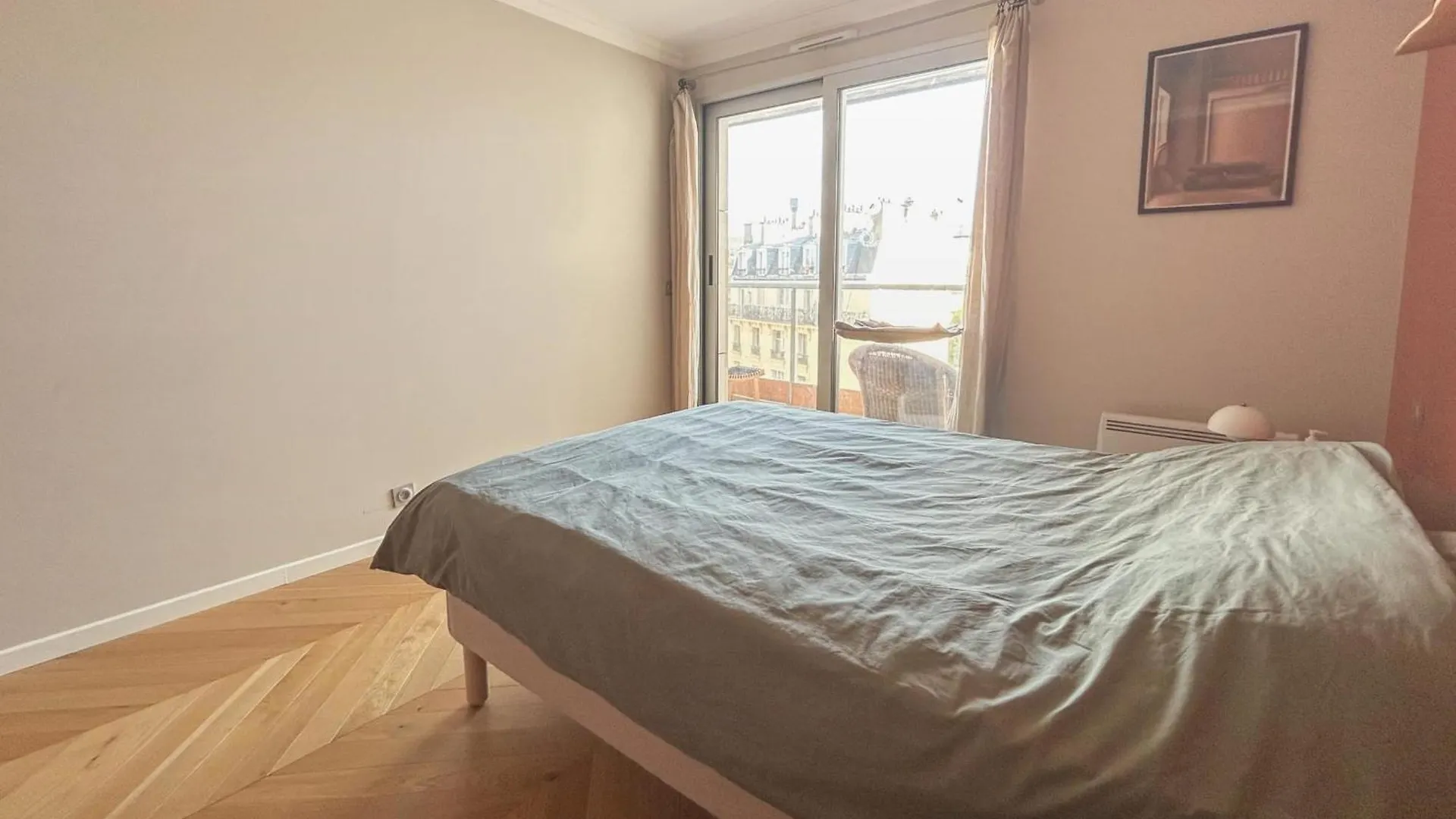 Spacious 2-Bedroom Apartment With Balcony Steps From Buttes-Chaumont Park Paris